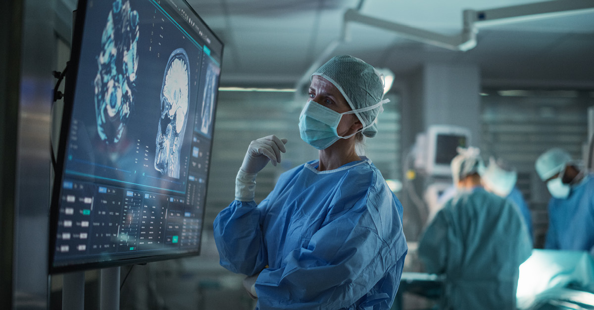 neurologist looking at an xray