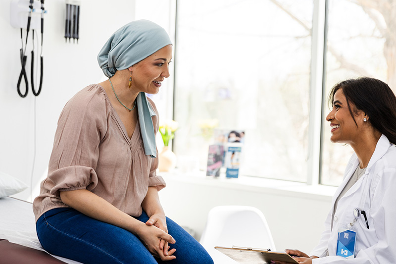 Cancer patient speaking with a doctor