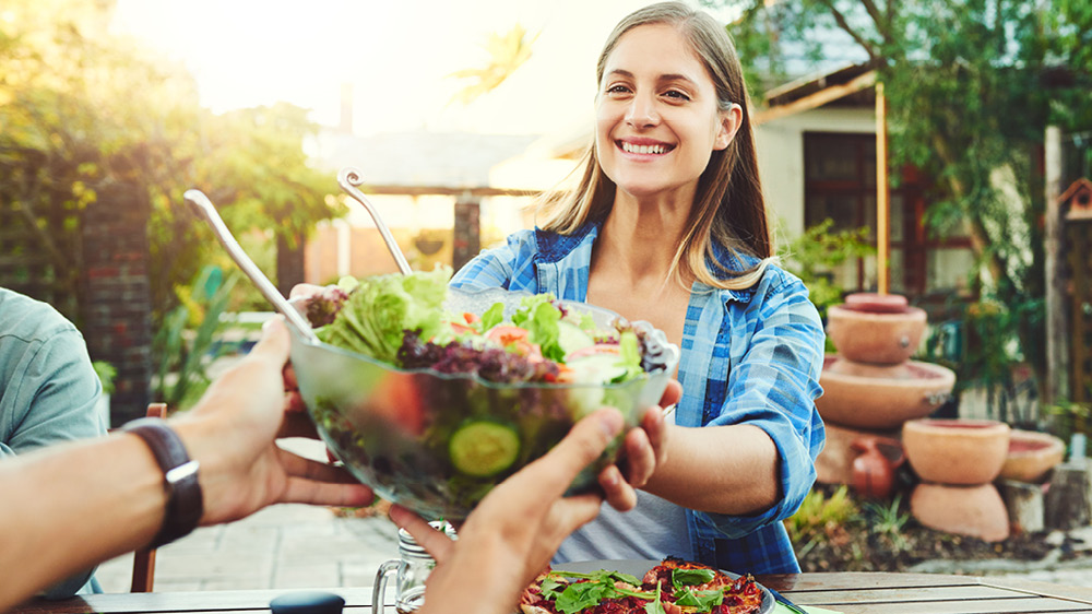 woman with healthy salad